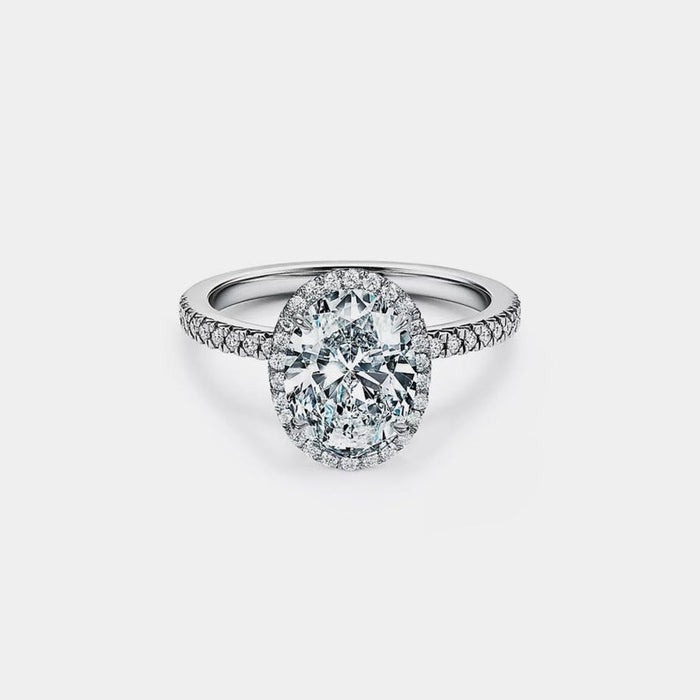 Oval halo moissanite ring in sterling silver